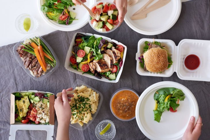 assorted takeaway foods on a table